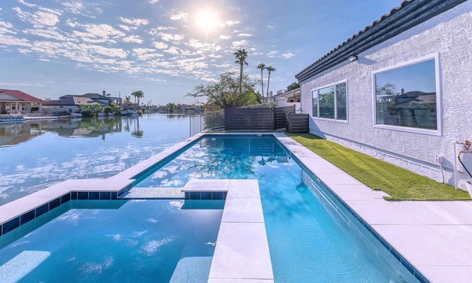 Val Vista Lakes House | Lakeside Luxe: Private Home in Gated Community with Heated Pool, Spa and More!