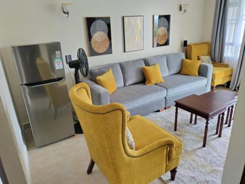 Rusinga Island Apartment | Lakeview Apartments - Serene Mustard