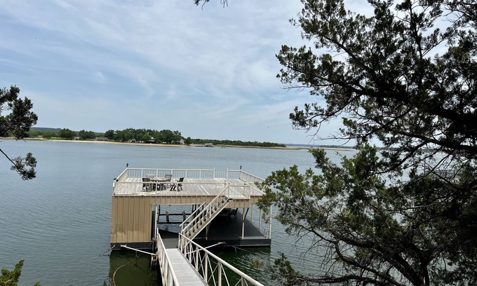 Graford House | Large, shady patio with deep-water two-story dock with sunset views. Sleeps 8