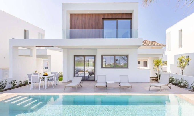 Softades House | Larnaca Blue 16 is a contemporary villa on a gated complex.