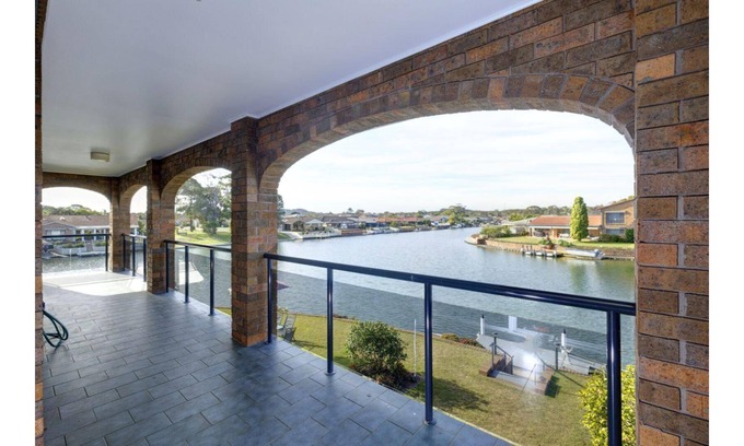 Forster House | Live the Waterfront Dream in this Exquisite Family Home!
