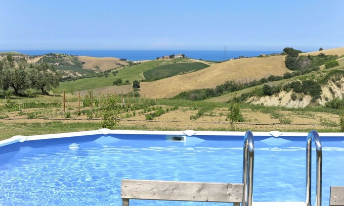 Cologna Spiaggia Villa | Lovely apartment in villa with hot tub, pool, WIFI, A/C, TV, patio, pets allowed, panoramic view