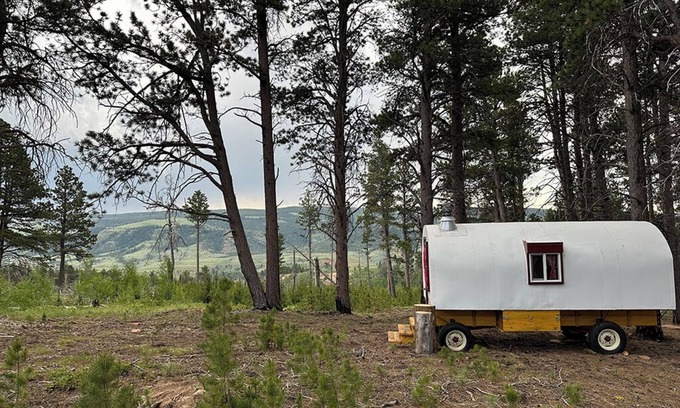 Casper House | Luxuriously Rustic Hand-Crafted Sheep Wagon in Private Wooded Area with Views