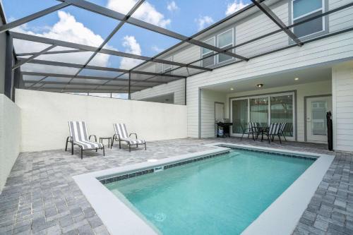 Four Corners House | Luxury 5BR Home with Private Pool - Minutes from Disney!
