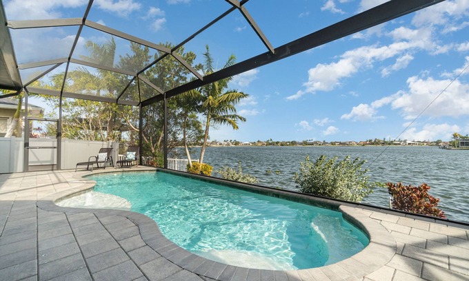 Cape Coral House | Luxury Lakeside Living w/Outdoor Kitchen & Heated Pool