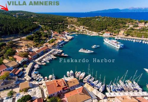 Fiskardo Villa | Luxury villa above emblisi beach , with heated pool !