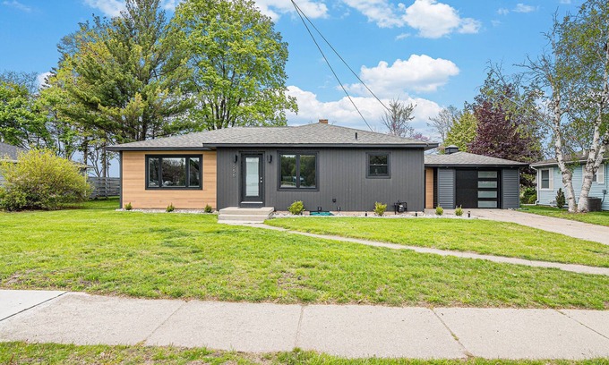Manistee House | Manistee Channel Waterfront Home with Boat Dock