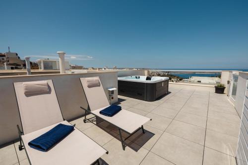 Mellieħa Heights Apartment | Mellieha Penthouse Seaviews Hot Tub By Homely