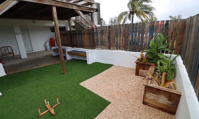 Crocus Hill Apartment | minutes to Town, Airport & Crocus Bay, apartment living beautiful courtyard.