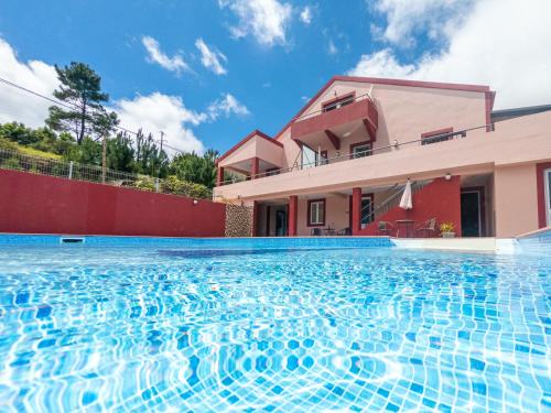 Campanario Apartment | Modern apartment in Prazeres with shared pool, 150 m²