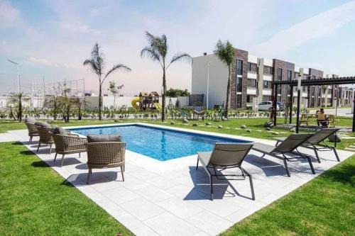 Coronango Apartment | Modern apartment with pool near VW-Finsa