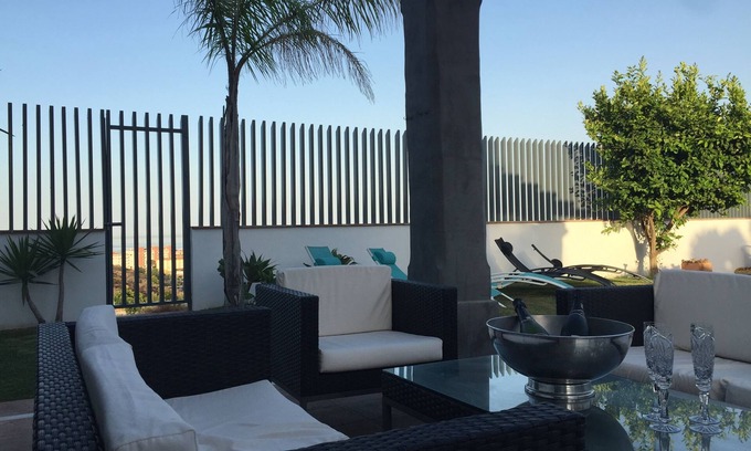 Urbanizacion Puerto de Estepona Villa | Modern Nordic inspired 4 bedroom villa with pool and fantastic views in Estepona
