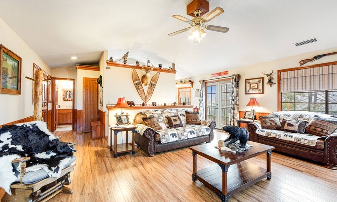 Cedarpines Park House | Mountain-view cabin with deck, gas grill, fireplace, foosball, & washer/dryer
