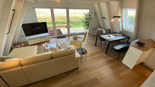 Carolinensiel House | Murmel 6 - E-Ladebox,Wallbox, Wlan, 2xWC