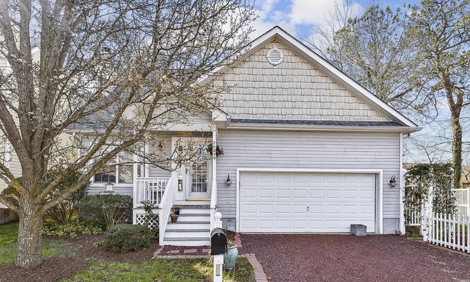 Clearwater House | NEW LISTING 2023! Charming and pretty vacation home in a quiet residential community features 3 bedrooms plus a loft with 2 full and 1 half baths that is just perfect for a family beach getaway!