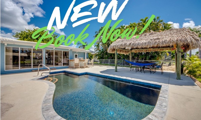 Fort Myers House | NEW LISTING! Heated Pool, Canal, Outdoor Bar, King Bed