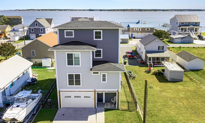 Long Neck House | New rental! This 3-level home has water views to die for! Just 30 min to Lewes and Rehoboth Beach!