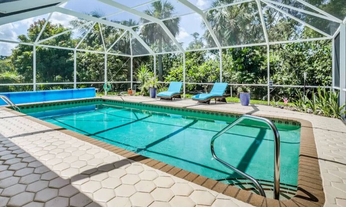 Fort Myers House | NEW! Waterfront Heated Pool, Kayaks, Fishing Pier, Fire Pit w/office
