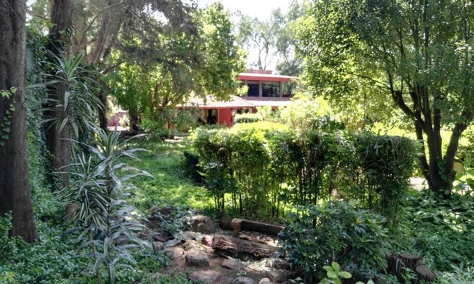 Leon Villa | Nice home with gardens and trees, 3 full bedrooms, living and kitchen