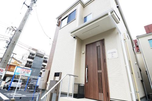 Shinjuku Villa | NYHotel 2 新宿2階建て3室1バスルーム1シャワー2トイレ
