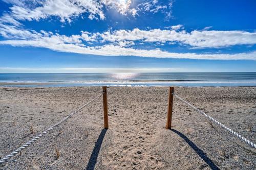 Long Beach Apartment | Oak Island Beachfront Condo with Community Pool