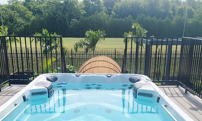Leamington House | Oasis with swim spa and lake view