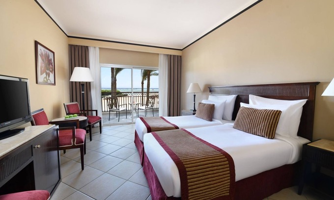 Sharm El Sheikh Hotel | Ocean‑Edge Resort Retreat: Pools, Spa, Dining & Kids’ Aqua Park Fun