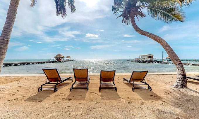 San Pedro Condo | Ocean-view apartment in a beachfront resort with shared pool, WiFi & partial AC