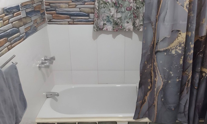 Whitehouse House | Oceanview Hilltop 2-Bedroom Unit in White House, JA with 75" Smart TV, AC & Wifi