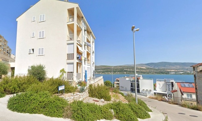 Municipality of Trogir Apartment | One bedroom apartment with balcony and sea view Mastrinka, Čiovo (A-24035-a)