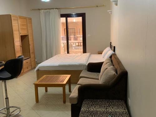 Al Ahyaa Ski Chalet | One-Bedroom Chalet at Turtles Beach Resort , Pool & Side Sea View C22