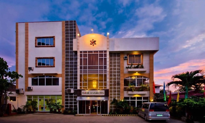 Puerto Princesa City Centre Hotel | OYO 880 Flores De Musa Inn