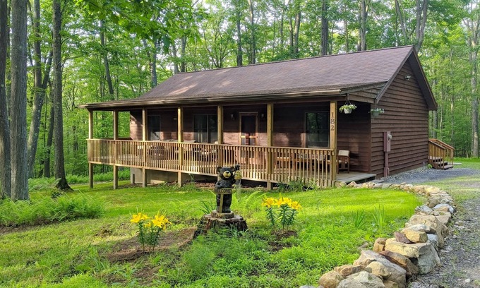 Swanton Cabin | Peaceful hideaway with large yard, hot tub, grill, firepit, smart TVs, & AC