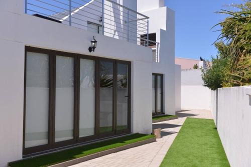Langebaan House | Pelican Cove is a Modern 4-Bedroom Holiday Home in Langebaan with some Sea Views
