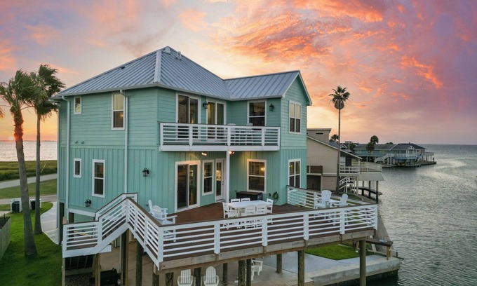 Jamaica Beach House | Pelican's Perch is a brand new home with the best sunset views in Jamaica Beach!