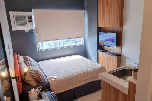 Highway Hills Apartment | Penthouse 1 at Urban Deca EDSA by CityStudio