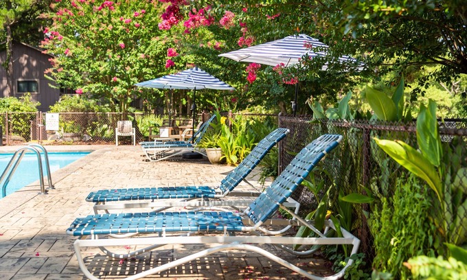 Mount Ida Apartment | Poolside King Cabana with full kitchen, king bed, sleeper sofa and pool access. by RedAwning