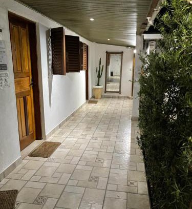 Tombo House | QUARTOS Praia do Tombo Guarujá