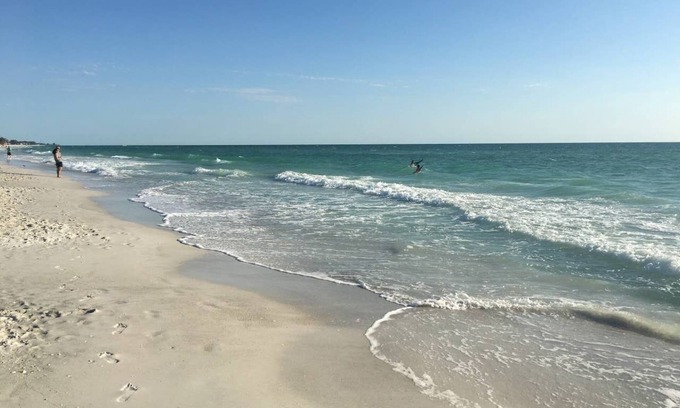Ilexhurst Cottage | Relax and Tan on Your Private Patio. Just a minute to the beach