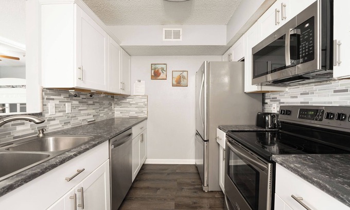 Indian Bayou Condo | Renovated 3BR 1st-Floor Pool+Gym 1 mi to Henderson Beach 3-Night Min
