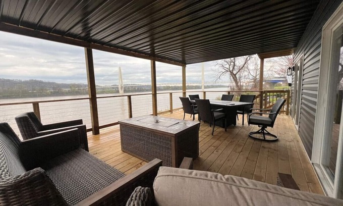 Russell Condo | RiverSuite1 - A mesmerizing river & bridge view.