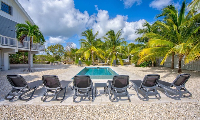 Doctor's Arm House | Secluded Tropical Retreat: 60' Dock, Large Pool, World-Class Fishing & Lobster