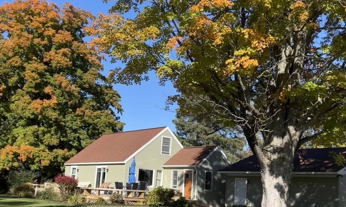 Benzonia House | South St Bungalow~ Great outdoor space with large private deck and yard!