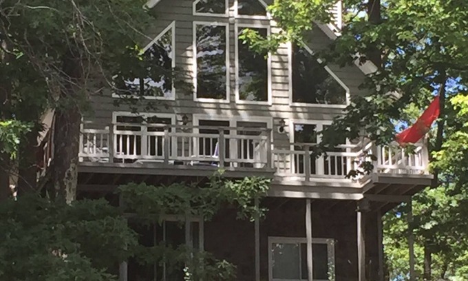 Fountain House | Spacious lakefront house on deep, all sports lake near Ludington & PM river