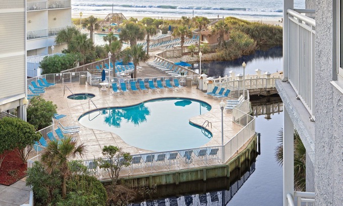 Arcadian Shores Resort | Spacious Oceanfront Resort with Onsite Restaurant, 5 Pools, 2 indoor Pools and Beach Access