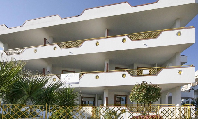 Villa Rosa Apartment | Spend a great vacation by the sea in this beachfront apartment.