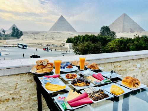 Giza Hotel | Sphinx Scarab Pyramids View