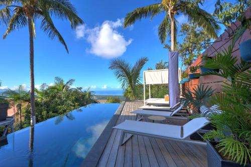 Les Avirons Apartment | Studio Ananas - Vue mer et piscine partagée