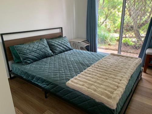 Mount Colah House | Stunning Garden View Queen Bedroom at MC 2079