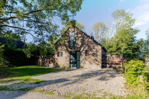 Ewijk House | Stylish vacation home with hot tub and sauna
